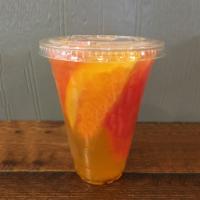 Passion Mixed Fruit Tea · Passion fruit, seasonal fruits, green tea, and housemade simple syrup. If no ice is requeste...