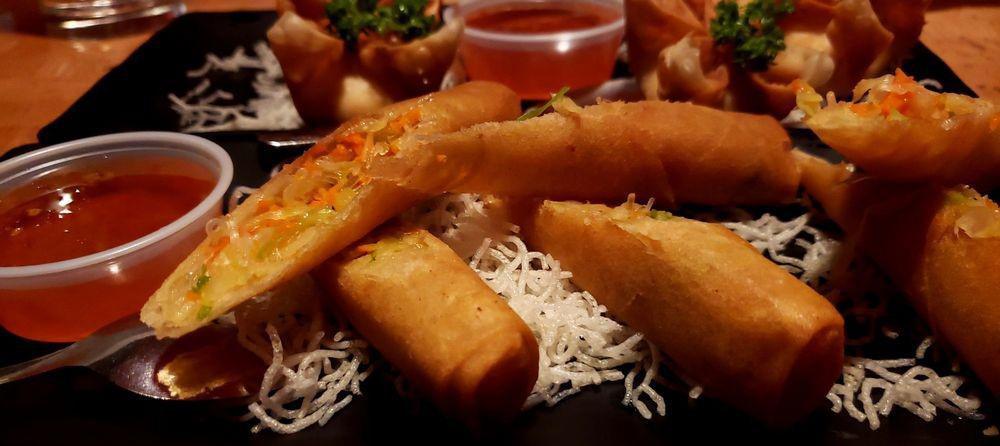 Vegetarian Crispy Rolls · Fried spring rolls filled with celery, cabbage, carrot and silver noodles served with homemade sweet and sour plum sauce.