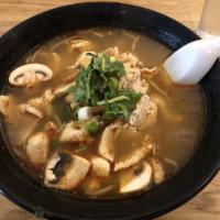 Tom Yum Noodle Soup · Spicy rice broth, bean sprouts and mushrooms with your choice of noodles.
