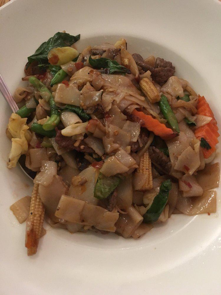 Thai Spicy Pan Fried Noodle · Pad kee mao. Flat rice noodle stir-fried with tomato, mushroom, bamboo, broccoli, bell pepper, onion and basil. Spicy.