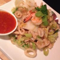 Sukiyaki · Wok-fried silver noodle, prawns, calamari and chicken, egg and Napa cabbage.