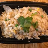 Crab Fried Rice · Fried rice with crabmeat, pea, carrot onion and fried onion.
