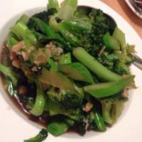 Wok Broccoli · A combination of Chinese and American broccoli stir-fried in garlic sauce.