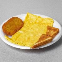 Egg Omelette · Served with hashbrown and toast choices include veggie, ham, bacon, or sausage.
