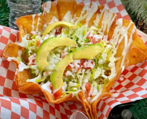 Taco Salad  · Served with meat of choice, beans, rice, sour cream, avocado, lettuce, tomato and cheese. 