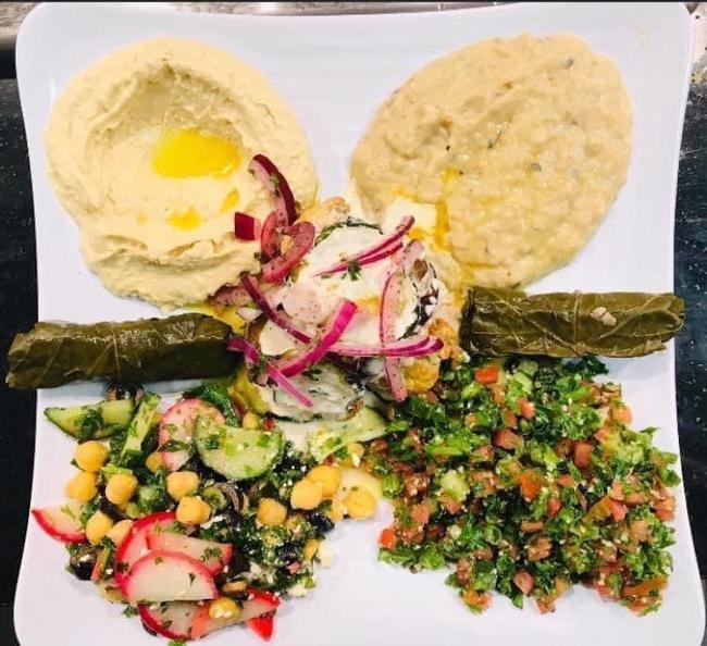 Mezze Plate · Choose 6 items from our Sides & Salads section ~ pita bread