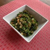 Lebanese tabbouleh · Bulgur, green onions, mint, parsley, tomatoes, cucumber, lemon juice
