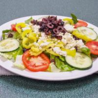 Greek Salad · Fresh romaine lettuce, Roma tomatoes, cucumber, banana peppers, feta cheese and Kalamata oli...
