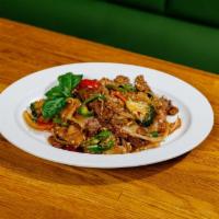 N5. Drunken Noodle · Sauteed wide noodle with choice of meat, chili paste and basil leaves. Spicy.