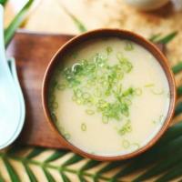 Miso Soup · Flavored with seasoned soybean paste. 