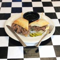 French Dip · Roast beef and provolone cheese. Served on hoagie bun and au jus for dipping.