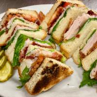 Club Sandwich · Smoked turkey, bacon, American cheese, lettuce, tomato and mayonnaise on triple white toast.
