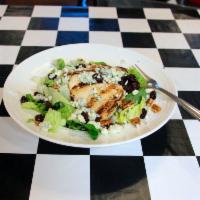 Michigan Cherry Salad · Mixed greens, toasted pecans, dried cherries and crumbled bleu cheese topped with a grilled ...