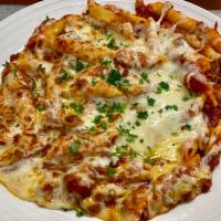 Baked Mostaccioli · Our homemade meat sauce tossed with penne noodles and then baked with our 3 cheese mixture. ...
