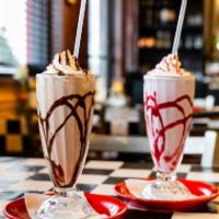 Shakes · Hot fudge, strawberry or caramel. Topped with whipped cream.