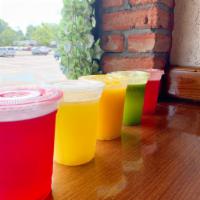 Agua Frescas · Hand-crafted: pineapple, mango or hibiscus.
