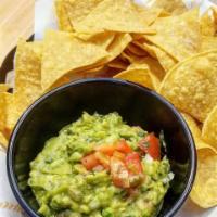 Guacamole · With housemade tortilla chips.