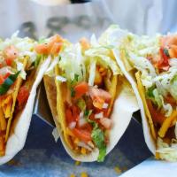 Taco Taco · 3 pieces. hard shell tacos, seasoned ground beef, cheddar cheese, lettuce, and tomato wrappe...