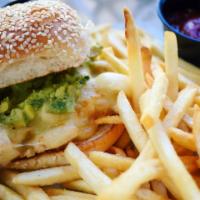 Tio Timmer Chicken Sandwich · Grilled chicken, Oaxaca cheese, guacamole, chipotle mayo, and sesame bun. Served with fries.