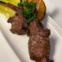 Grilled Lamb Chops · 3 pieces of slow grilled lamb chops , garlic and black peppers