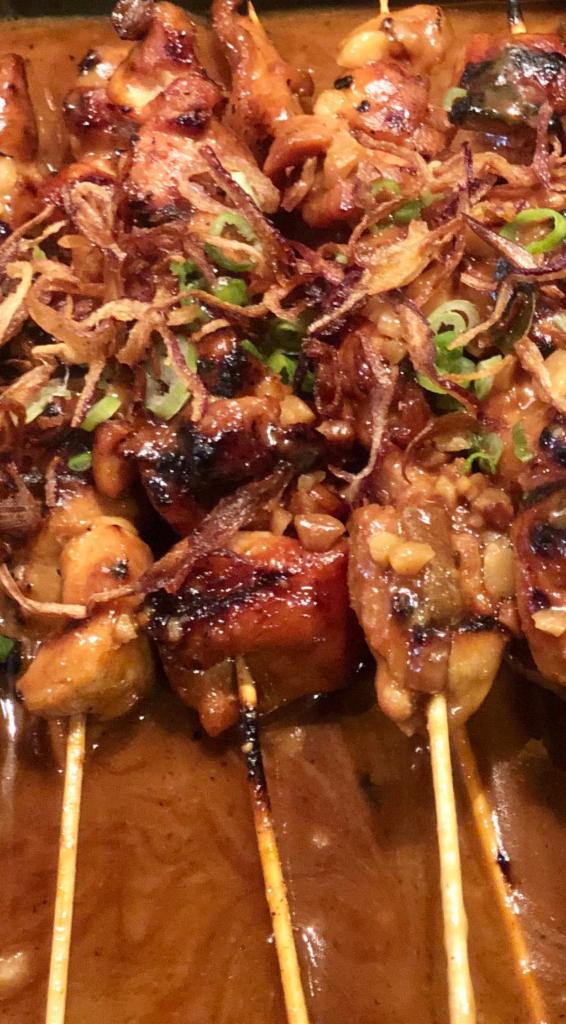 Satay Chicken Appetizer · Skewered chicken with peanut sauce. Tapes style serving.