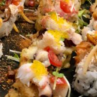 Kraken Roll · 6 pieces. Inside: tempura asparagus, avocado, deep fried. Outside: grilled lemon butter garl...