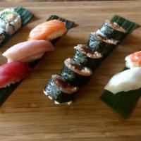 Deluxe Assorted Sushi · 4 pieces california roll, 5 pieces spicy tuna roll, 1 piece each of maguro, hamachi, sake, e...