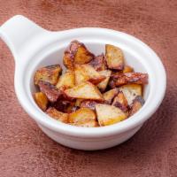 Home Fries · Fried seasoned potatoes.