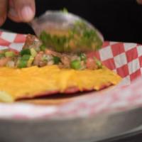 Big’z Chalupa Burger · A crispy chalupa shell loaded with refried beans, cheddar cheese and fresh-made pico de gall...