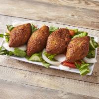 4 Fried Kibbeh · Shells of cracked wheat stuffed with lamb, onions and pine nuts.