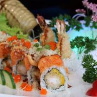 Angel Roll · In shrimp tempura and mango. Out spicy salmon, crunch with eel, and spicy mayonnaise sauce.
