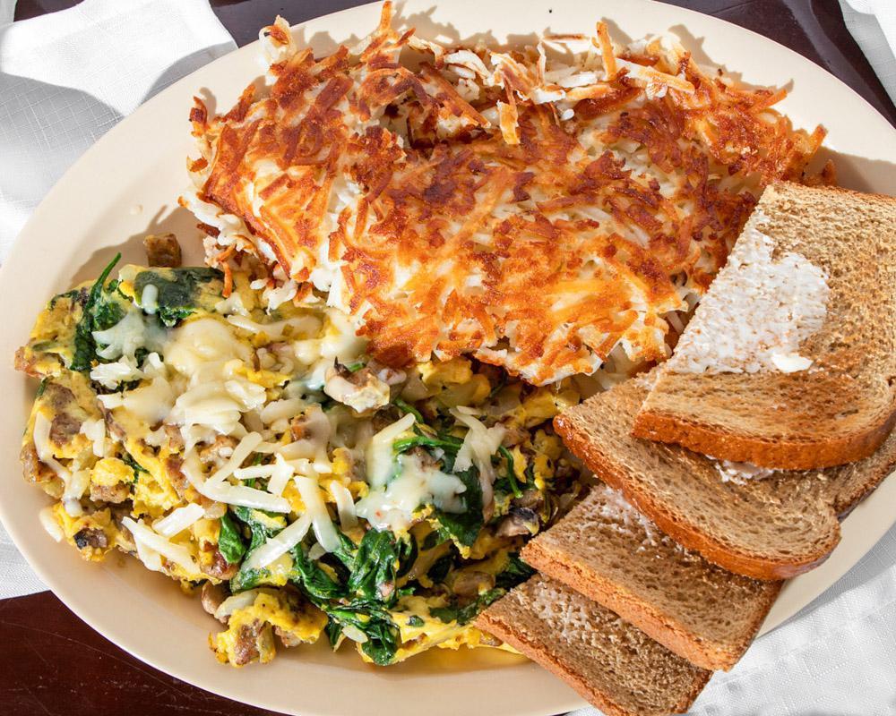 Emil's Ultimate Scramble · Spinach, diced country sausage, onion, mushroom and pepper jack cheese.