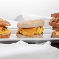 Egg Melt Sandwich · Egg, cheese, Emil's Sweet Sauce & choice of style and bread. Add Hash Browns for an addition...