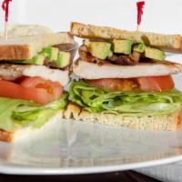 Chicken Club Sandwich · Chicken breast, lettuce, tomato and avocado on sourdough.