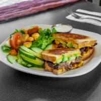 California Patty Melt · Served with bacon, avocado, grilled onion, Emil'sauce and American cheese on sourdough.