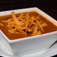 Tortilla Soup · Chicken | Crispy Corn Tortilla Strips | Tomato | Cotija Cheese | Monterey Jack Cheese | Avoc...