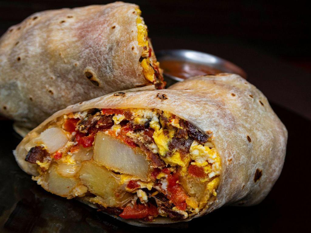 Breakfast Burrito · Scrambled Eggs | Monterey Jack Cheese | Bacon | Potato | Roasted Red Peppers | Side of Salsa Roja