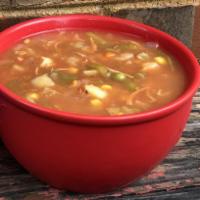Homemade Chicken Vegetable Soup · Quart size (32 oz.) container of Mcentyre's homemade chicken vegetable soup.