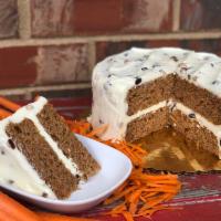 Carrot Cake · Moist carrot spice layers covered in Mcentyre's scratch made carrot cake icing (cream cheese...