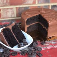 Devil's Food Cake with Chocolate Fudge Icing · Decadent devil's food chocolate cake layers covered in McEntyre's scratch made, stove cooked...