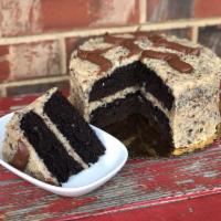German Chocolate Cake · Moist devil's food chocolate cake layers covered in mcentyre's hand stirred, stove cooked ge...
