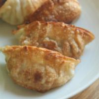Fried Mandu · Deep fried pork & beef dumpling (10 pcs)