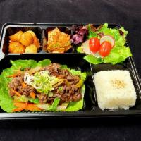 Beef Bulgogi Dosirak · Marinated sliced beef served w/salad, assortment of side dishes & rice.