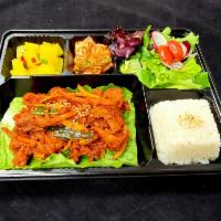 Pork Bulgogi Dosirak · Marinated spicy pork served w/salad, assortment of side dishes & rice.
