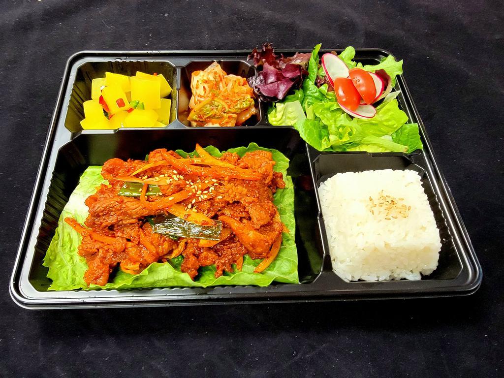 Pork Bulgogi Dosirak · Marinated spicy pork served w/salad, assortment of side dishes & rice.