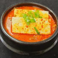 Kimchi Jjigae · Kimchi stew with pork and tofu.