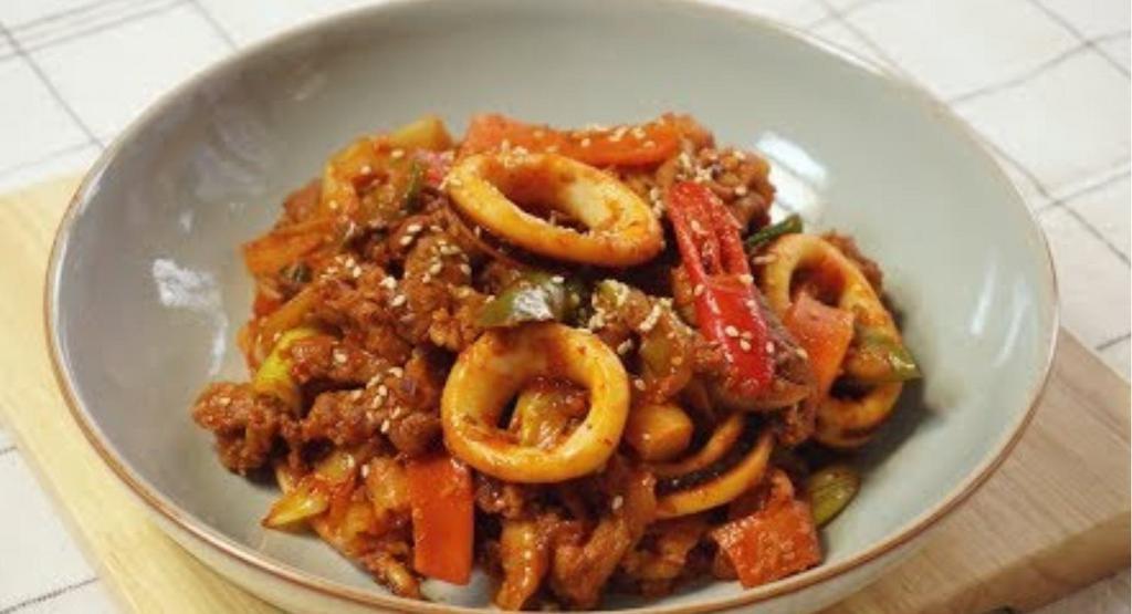 Osam Bulgogi · Stir-fried squid and pork belly with vegetables.