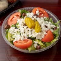 Greek Salad · Romaine lettuce, tomatoes, cucumbers, red onions, feta cheese, and pepperoncini served with ...