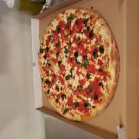 Margherita Pizza · Plum tomatoes, fresh mozzarella, fresh garlic, fresh basil, Pecorino Romano and finished wit...