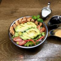 Avocado Cajun Shrimp Salad · Grilled Cajun seasoned shrimps with avocado, crisp hearts of romaine and baby arugula mixed ...